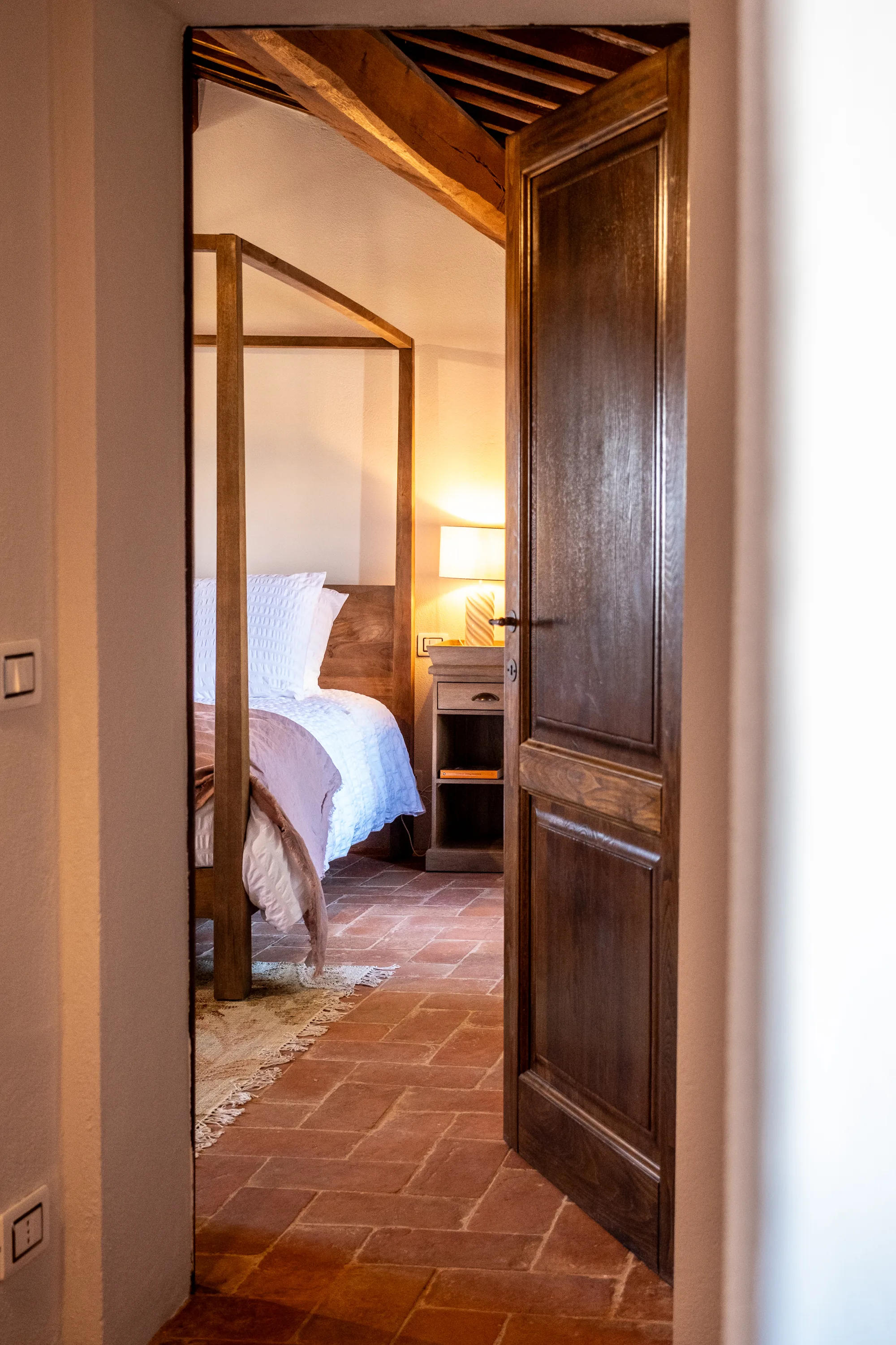 Four poster bedroom seen from the doorway