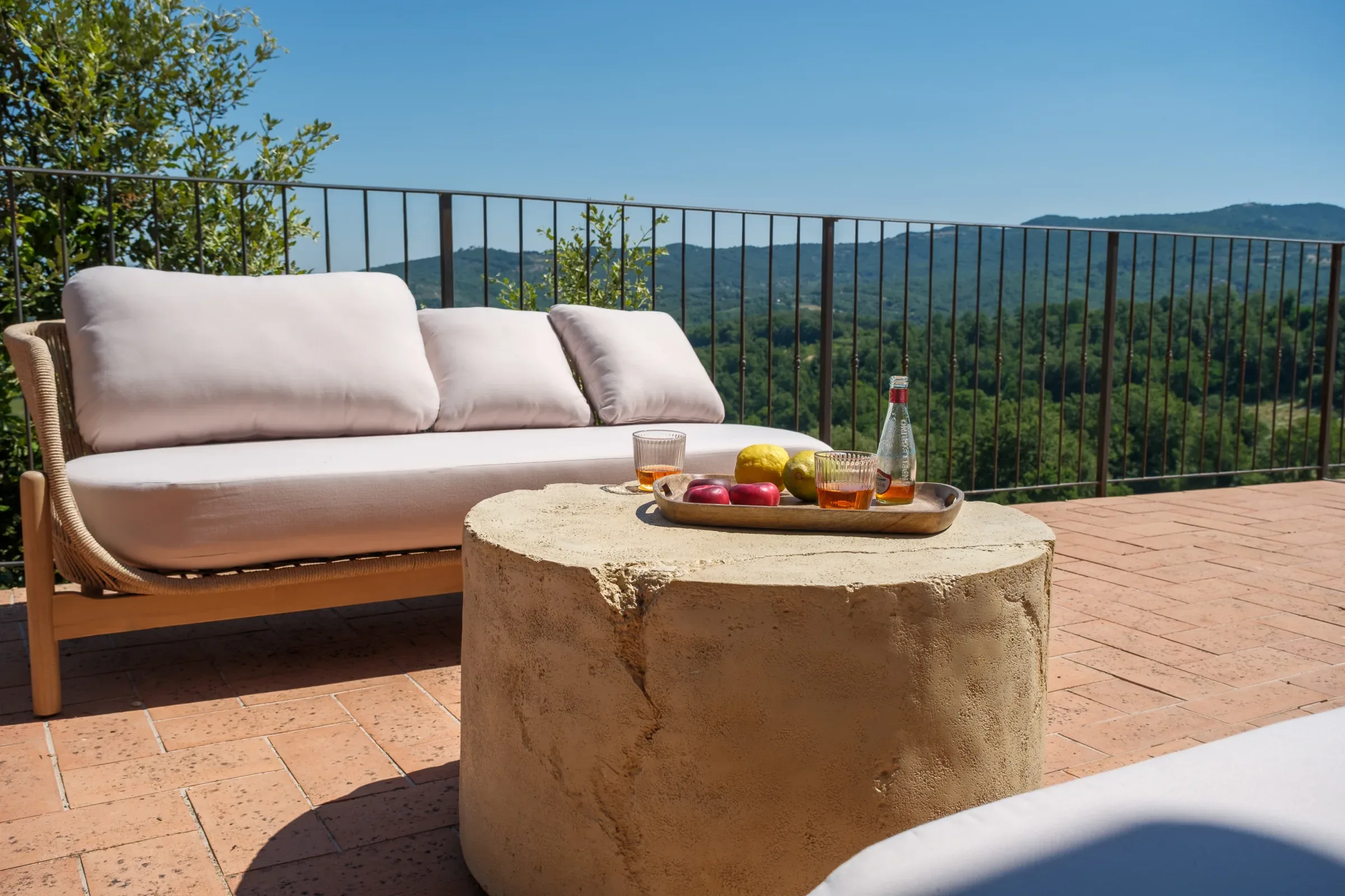 Terrace sofa and fruit overlooking the hills
